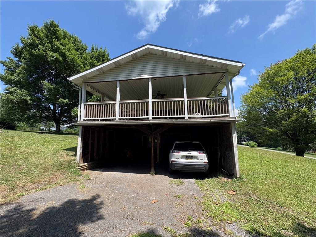 94 Middle Road Reynoldsville, PA 15851 - Photo 6 of 36 a house view with a garden space