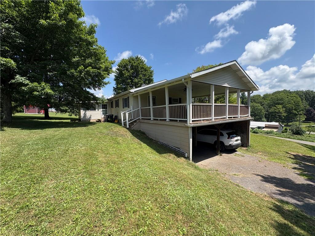 94 Middle Road Reynoldsville, PA 15851 - Photo 7 of 36 a view of a house with a yard