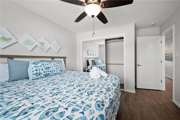a bathroom with a sink toilet and shower curtain