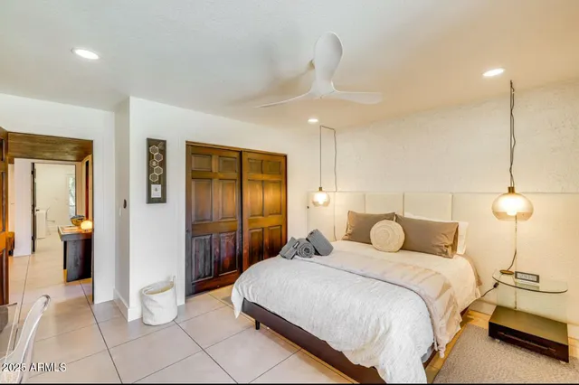 a bedroom with a bed and furniture