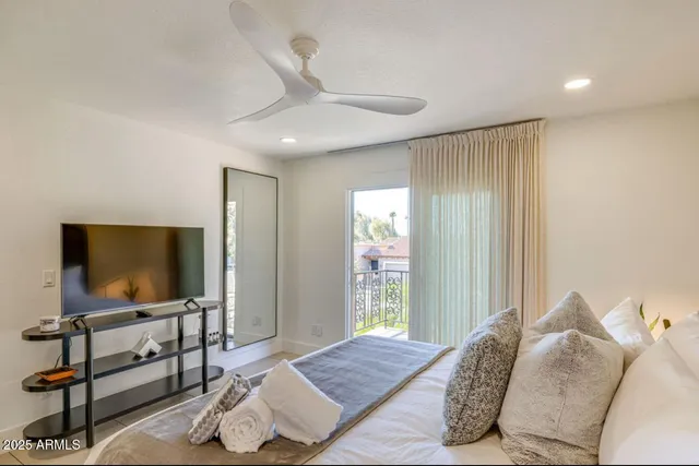 a view of balcony with furniture