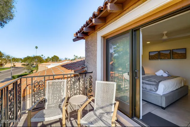 a workspace with furniture and wooden floor