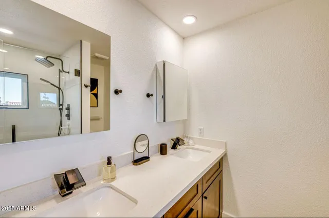 a bathroom with a shower and a toilet