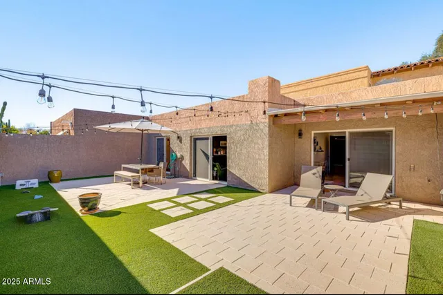 a table and chairs in the patio