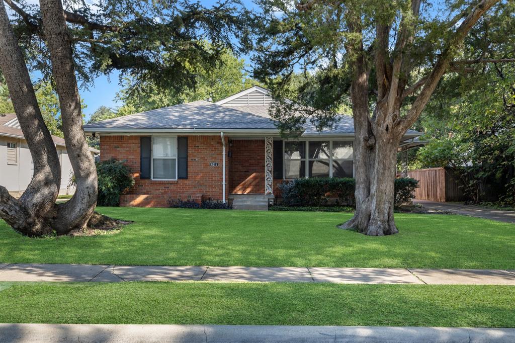 6317 Ravendale Lane Dallas, TX 75214 - Photo 2 of 16 a view of a house with backyard porch and garden