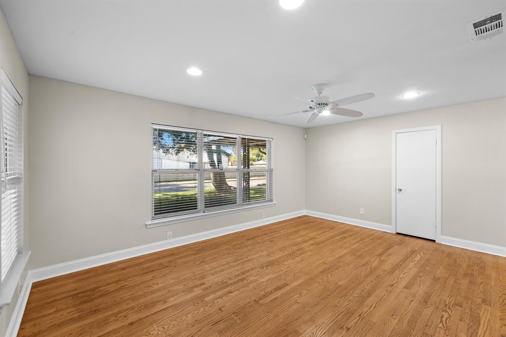 6317 Ravendale Lane Dallas, TX 75214 - Photo 3 of 16 a view of an empty room with a window