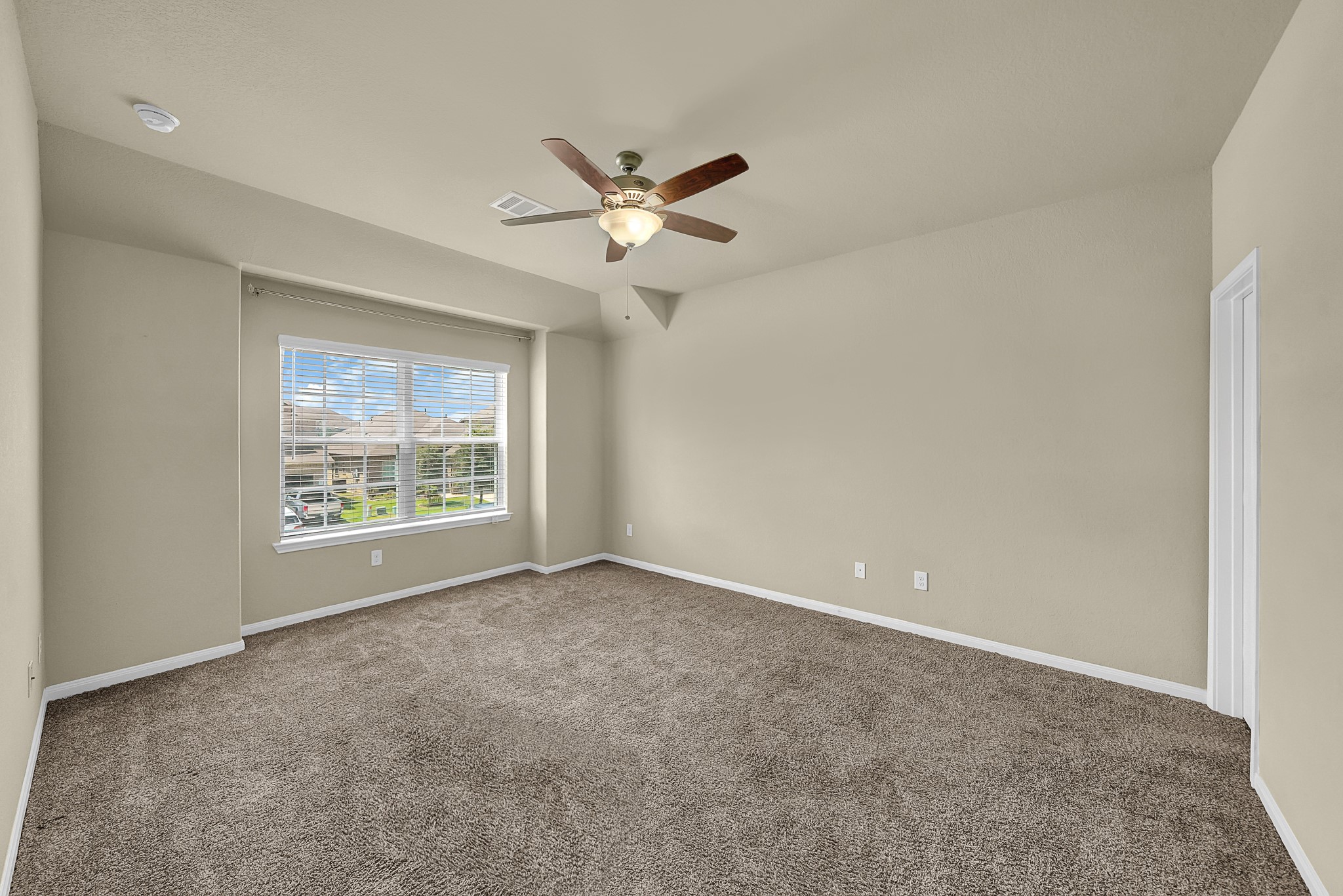 4274 McGregor Blf Lane Conroe, TX 77304 - Photo 11 of 25 a view of an empty room with a window