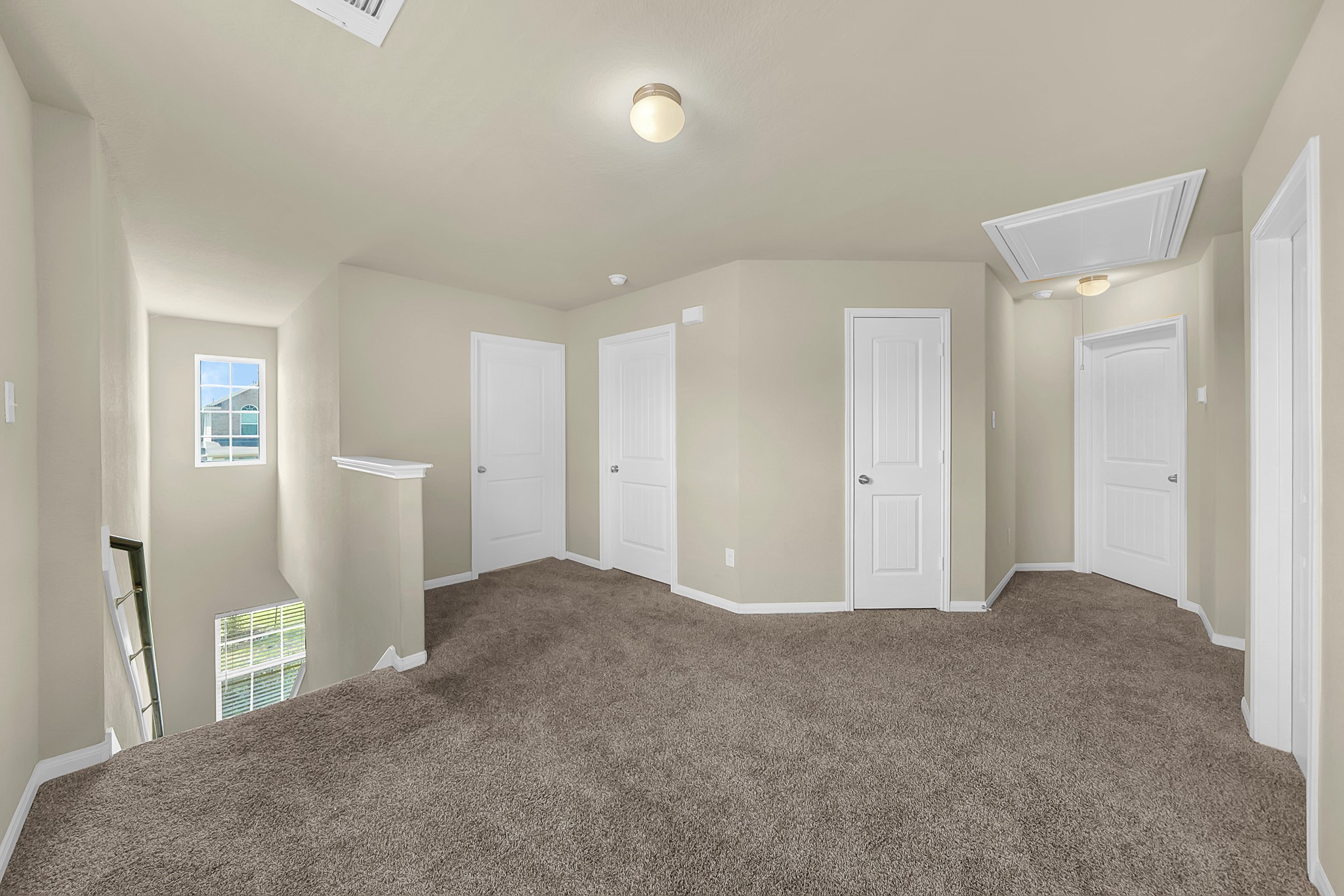 4274 McGregor Blf Lane Conroe, TX 77304 - Photo 20 of 25 a view of an empty room with closet and wooden floor