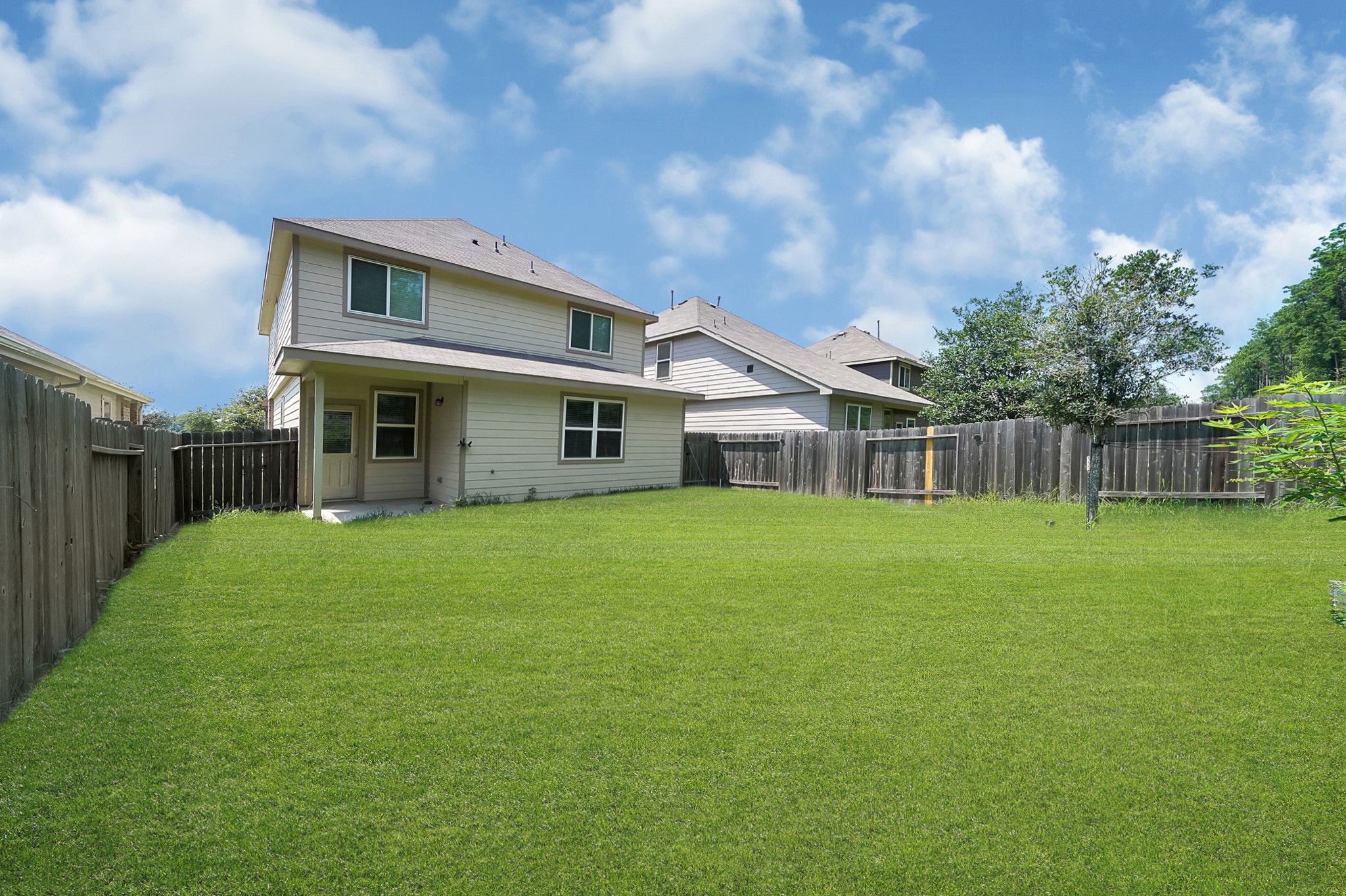 4274 McGregor Blf Lane Conroe, TX 77304 - Photo 25 of 25 a front view of house with yard and green space