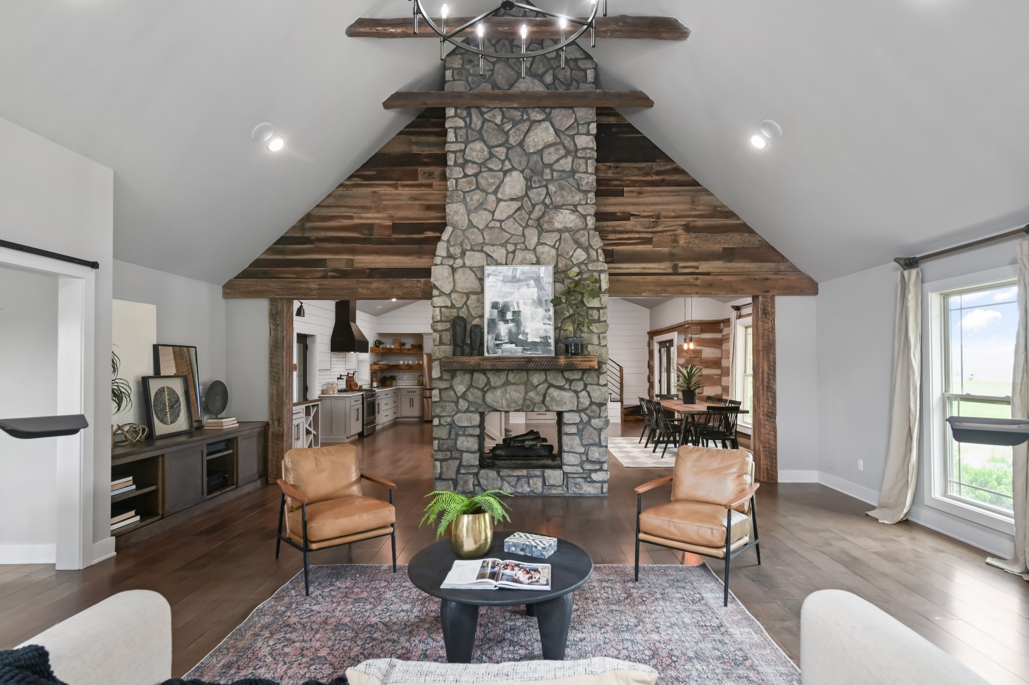 6557 Lamont Road Springfield, TN 37172 - Photo 12 of 62 a living room with furniture and a chandelier