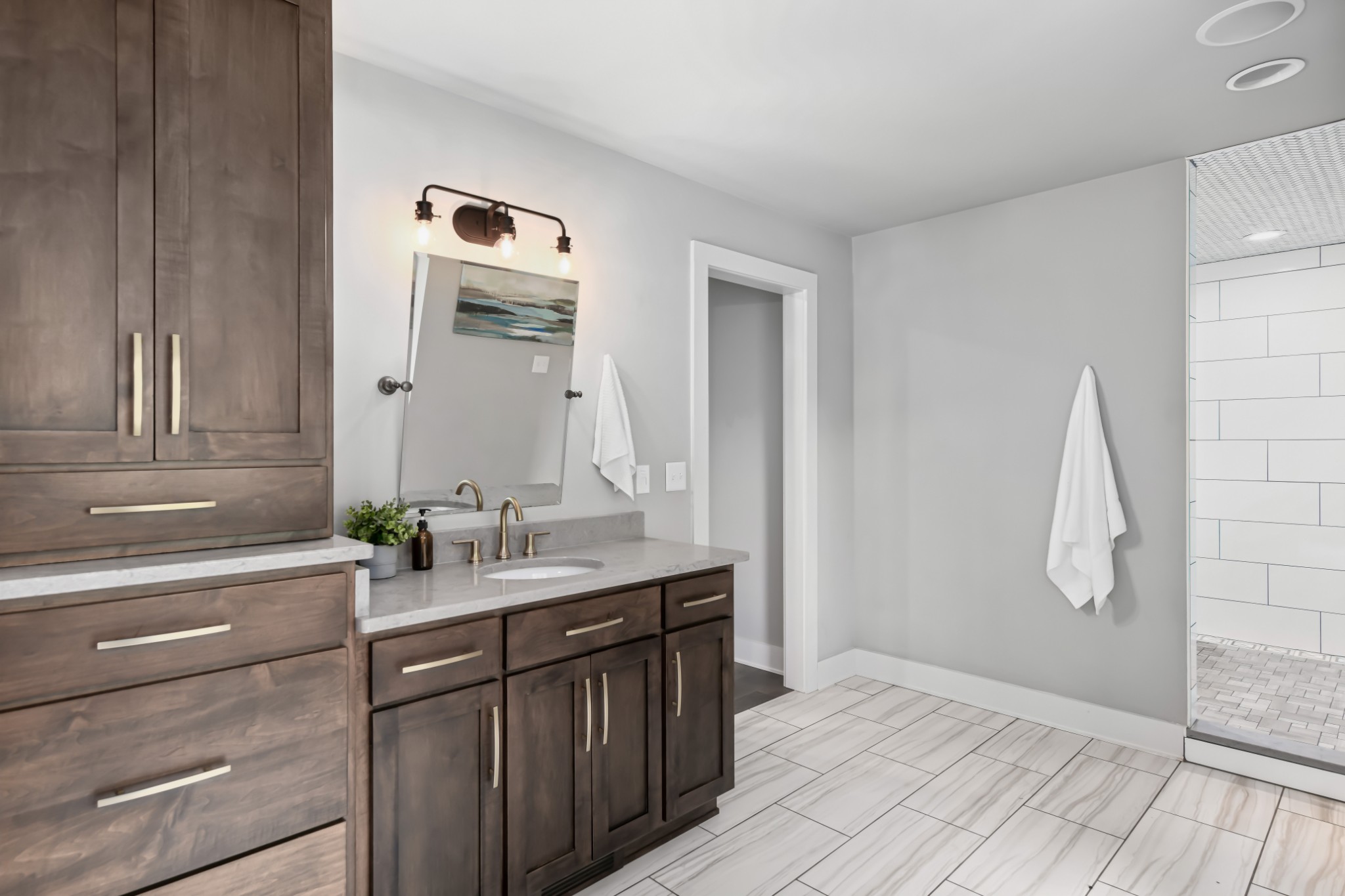 6557 Lamont Road Springfield, TN 37172 - Photo 22 of 62 a bathroom with a double vanity sink and a mirror