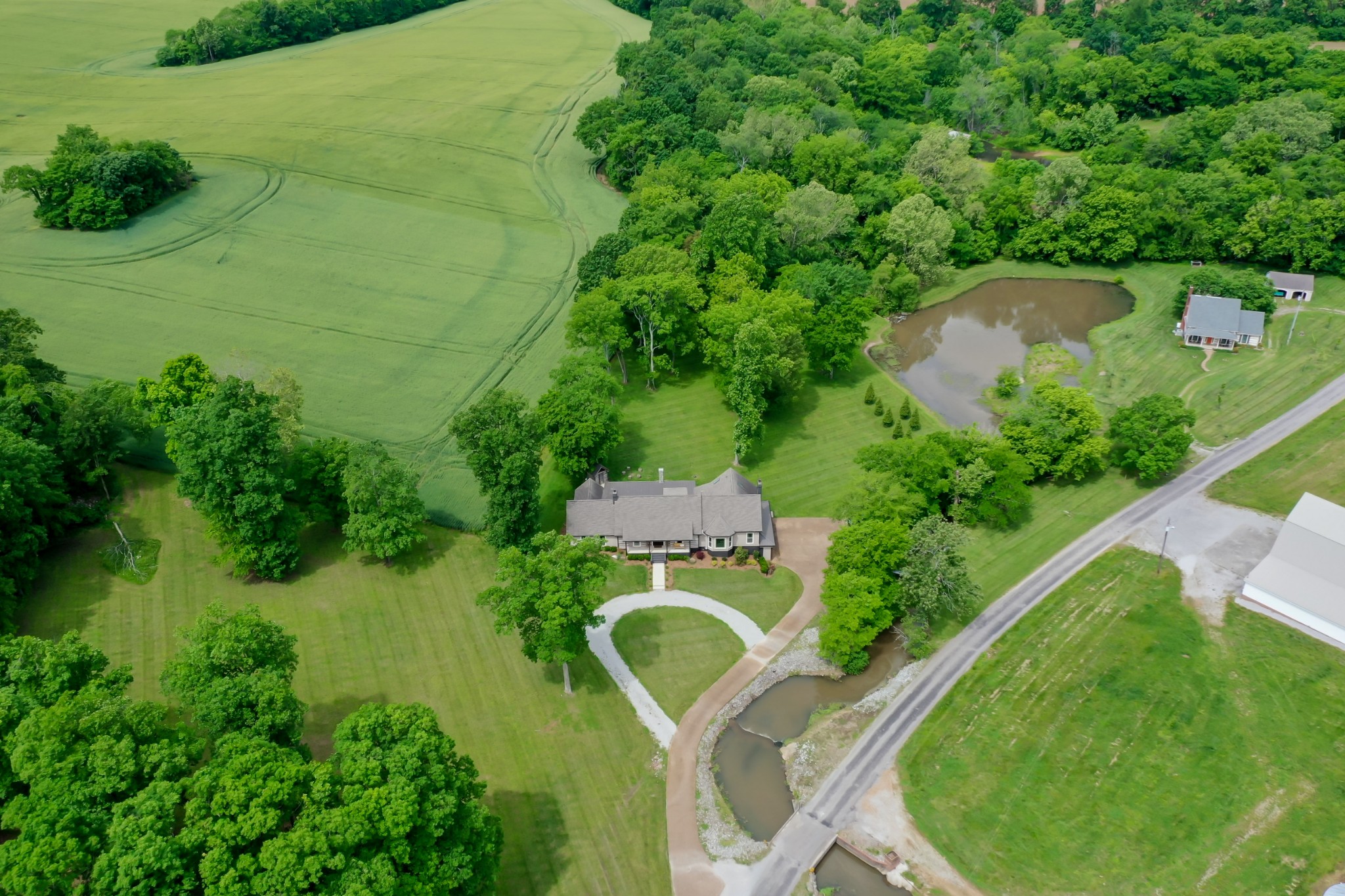 6557 Lamont Road Springfield, TN 37172 - Photo 39 of 62 an aerial view of a house with pool yard seating and yard