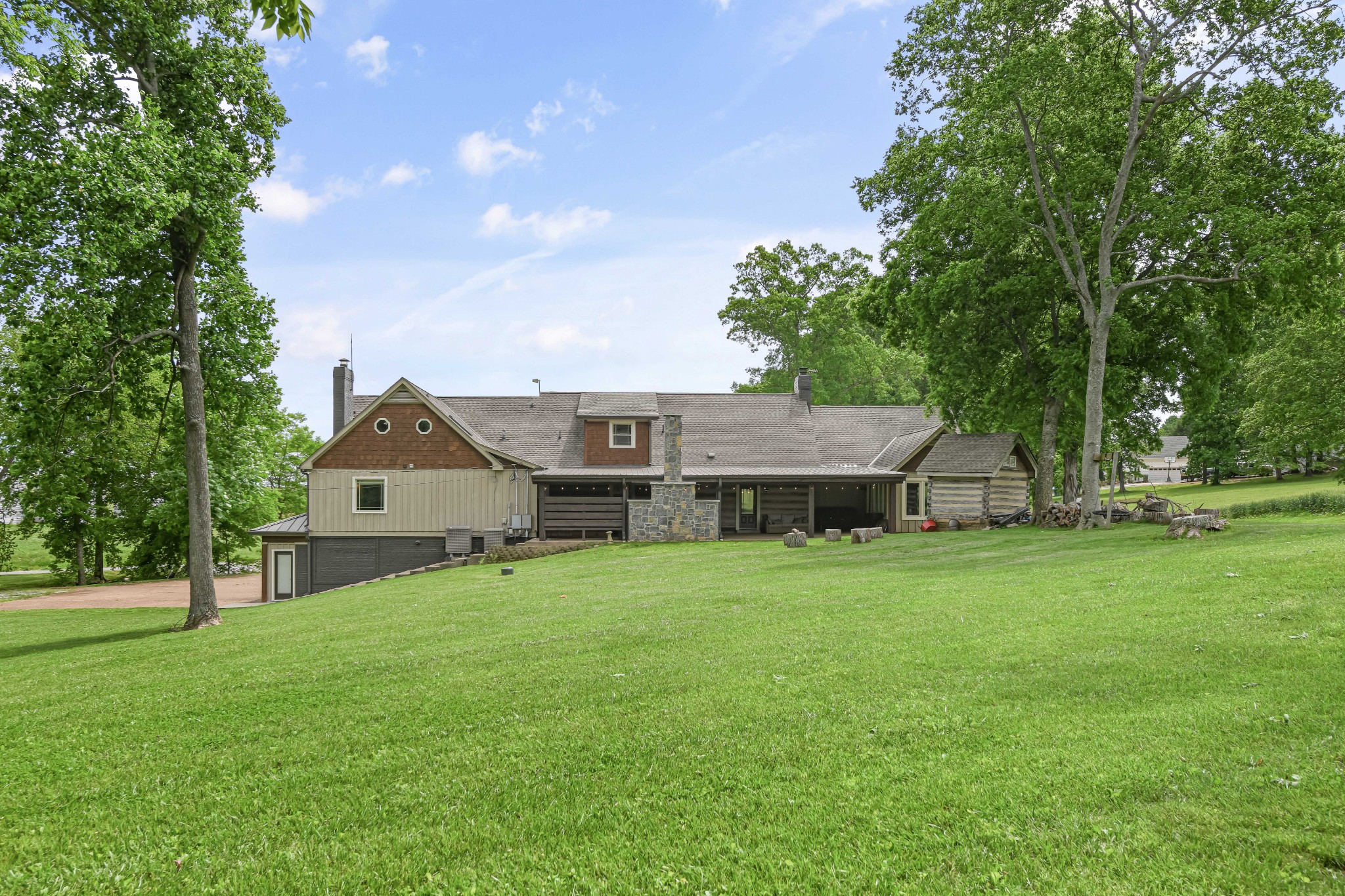 6557 Lamont Road Springfield, TN 37172 - Photo 49 of 62 a front view of a house with a yard and trees