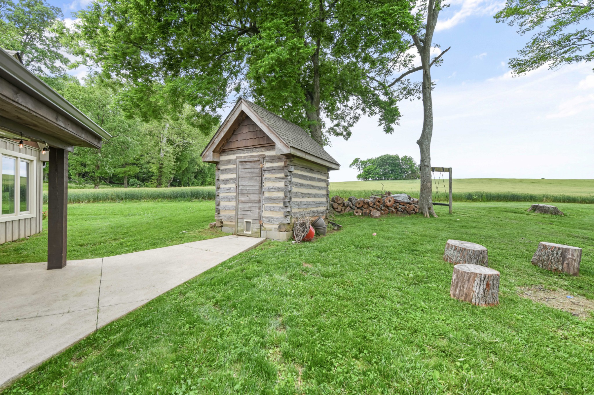 6557 Lamont Road Springfield, TN 37172 - Photo 55 of 62 a view of a house with a yard porch and sitting area