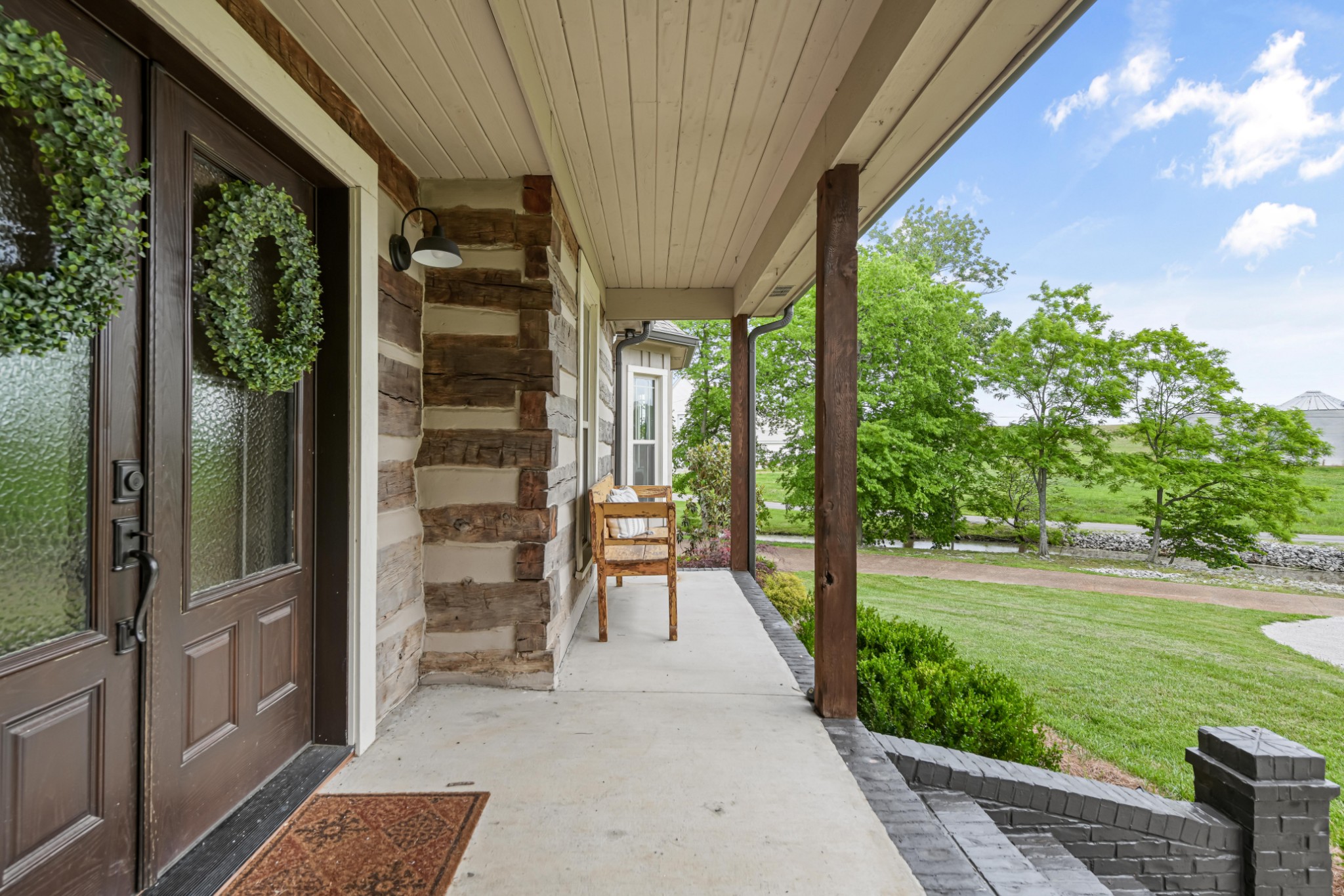 6557 Lamont Road Springfield, TN 37172 - Photo 62 of 62 a view of a porch with chairs and backyard