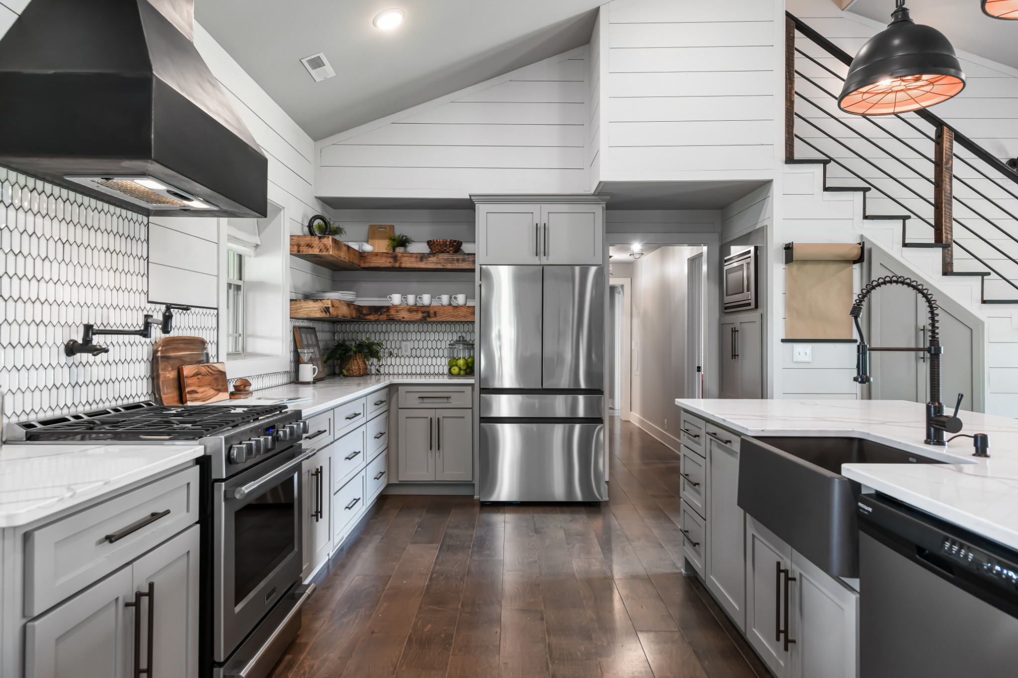 6557 Lamont Road Springfield, TN 37172 - Photo 7 of 62 a kitchen with stainless steel appliances granite countertop a sink a stove and a refrigerator