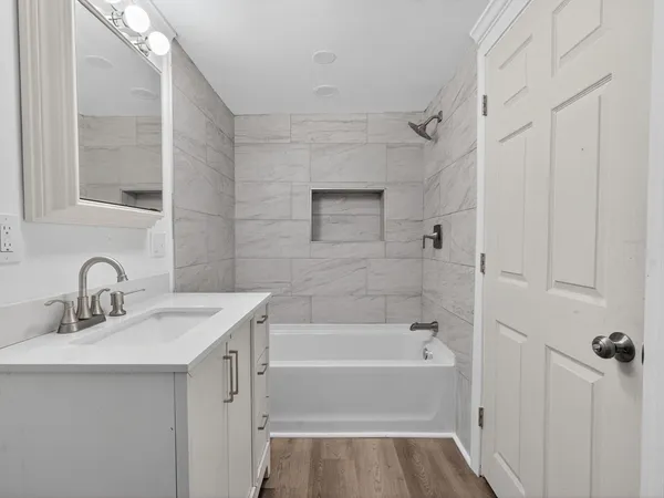 a bathroom with a sink and a bathtub
