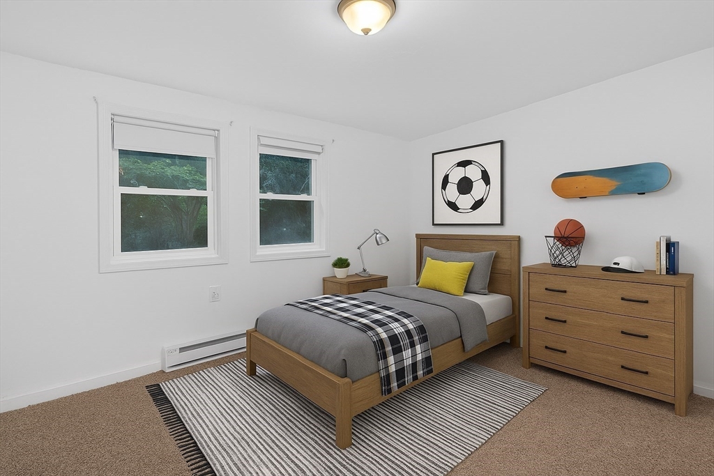 44 Liberty Street Randolph, MA 02368 - Photo 16 of 41 a bedroom with a bed and a window