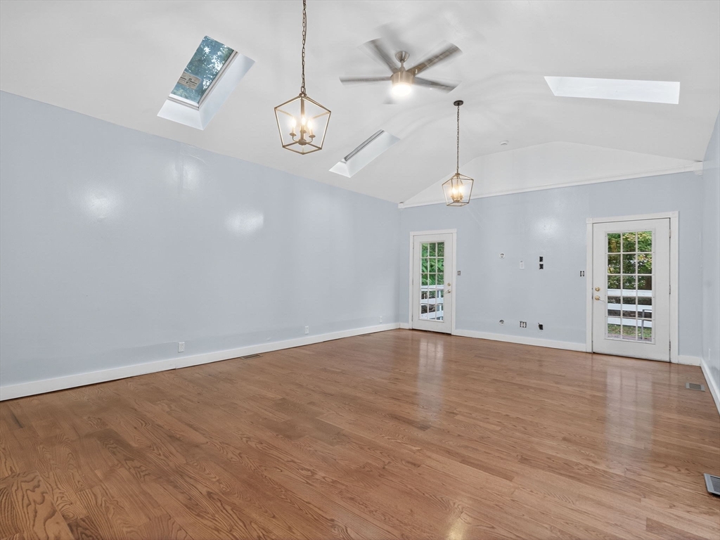 44 Liberty Street Randolph, MA 02368 - Photo 19 of 41 an empty room with wooden floor and windows