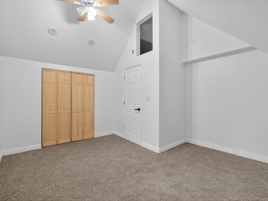 44 Liberty Street Randolph, MA 02368 - Photo 27 of 41 an empty room with a empty space and windows