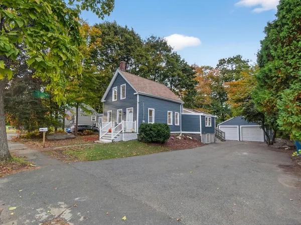 a view of a house with a garage