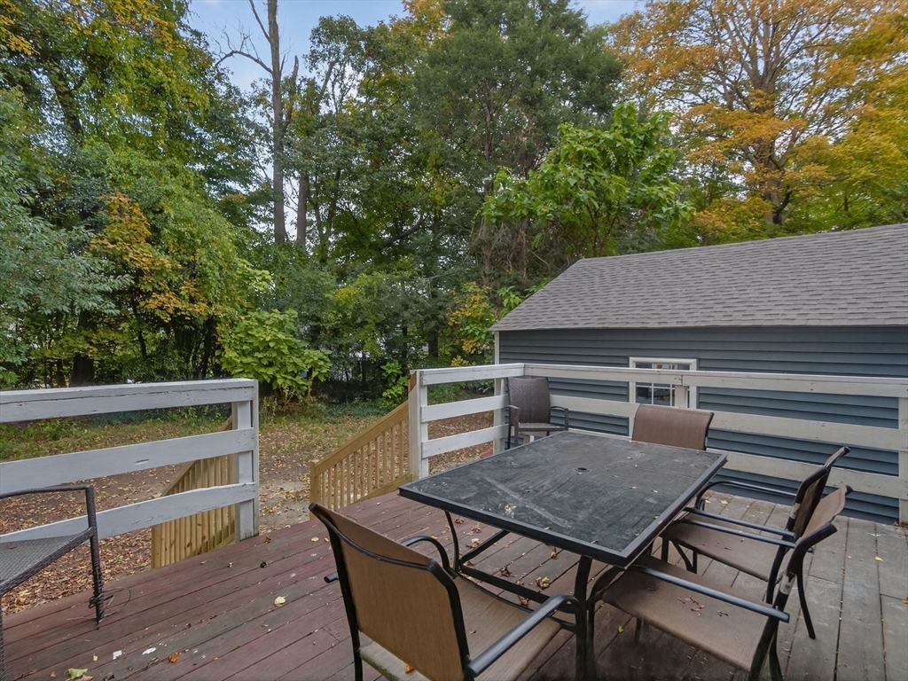 44 Liberty Street Randolph, MA 02368 - Photo 34 of 41 a backyard of a house with table and chairs