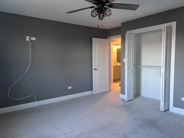 a view of an entryway with a mirror