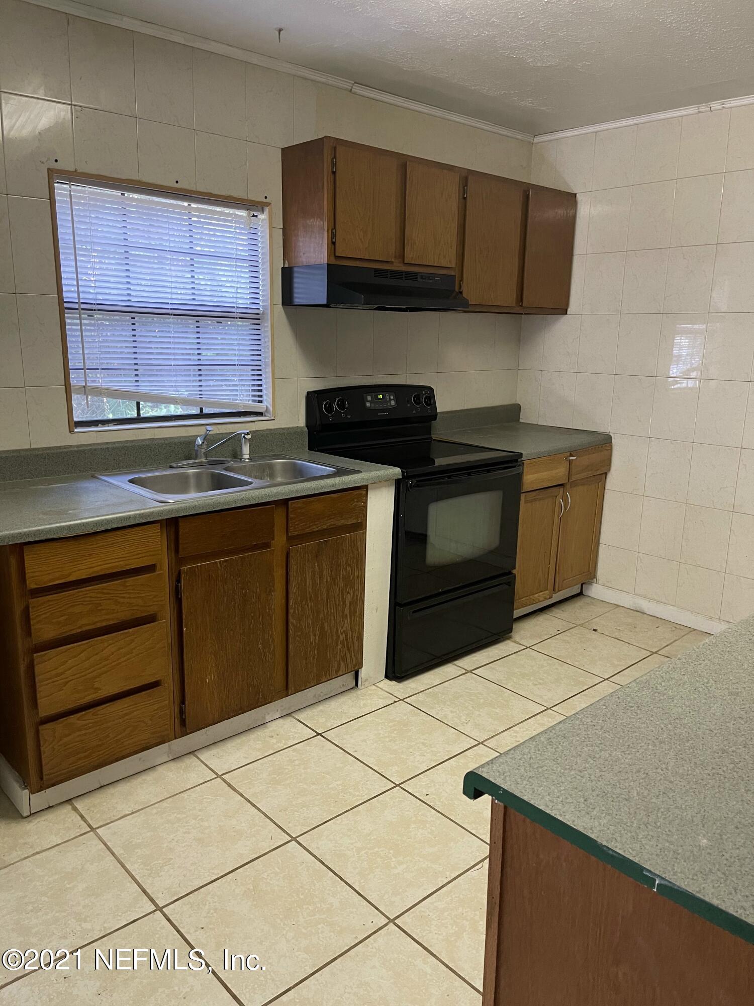 4127 Collins Road Jacksonville, FL 32244 - Photo 6 of 33 IMG_7308