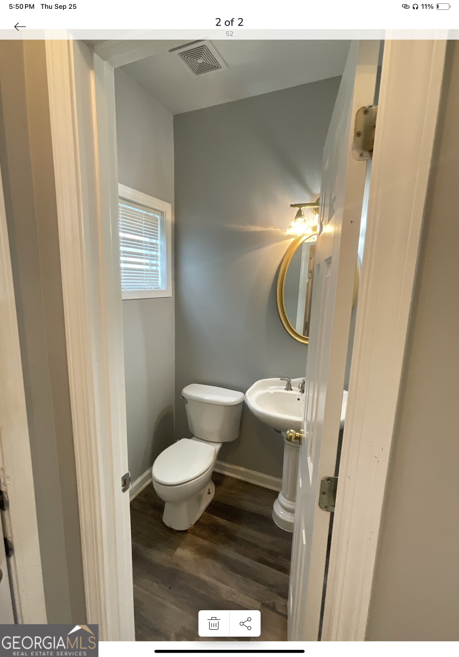 4222 Quailbrook Court Tucker, GA 30084 - Photo 12 of 19 a bathroom with a sink a toilet a mirror and vanity