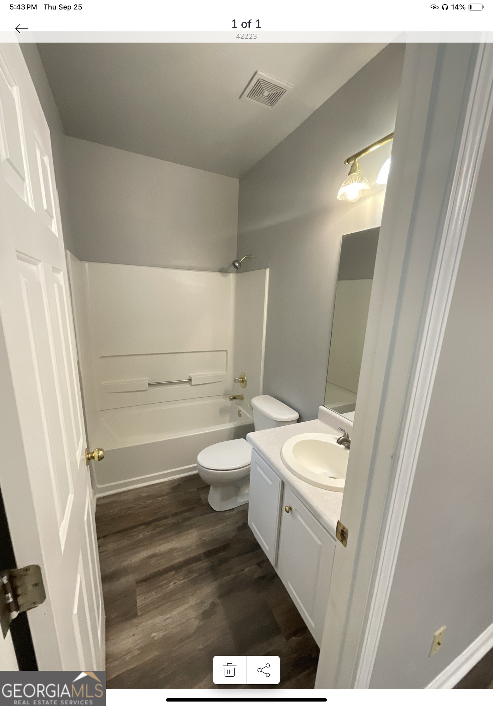 4222 Quailbrook Court Tucker, GA 30084 - Photo 13 of 19 a bathroom with a sink a toilet and a mirror