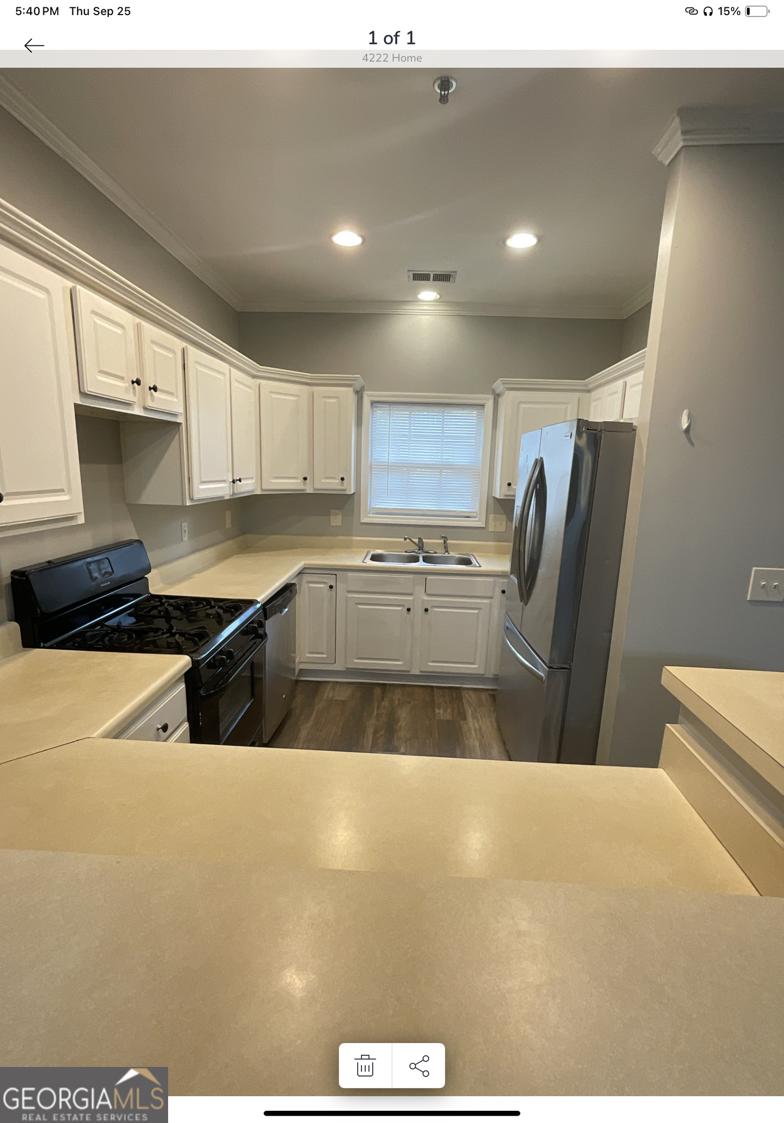 4222 Quailbrook Court Tucker, GA 30084 - Photo 9 of 19 a kitchen with stainless steel appliances granite countertop a refrigerator a stove and a sink