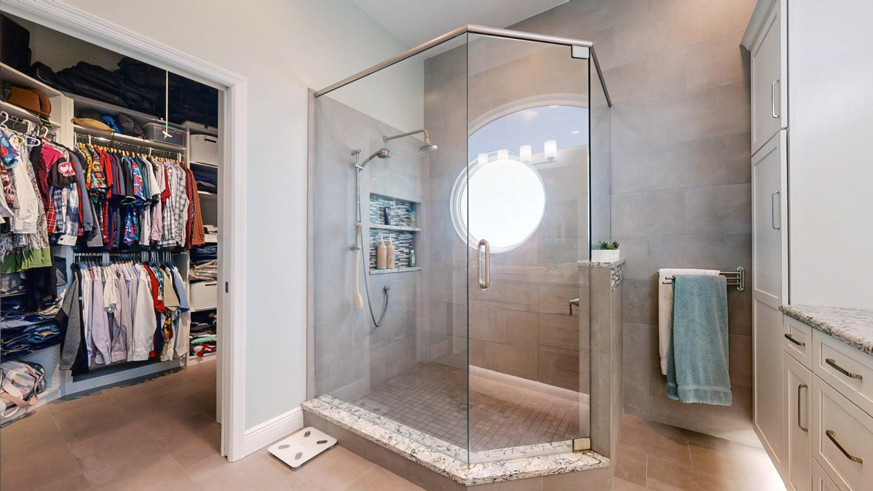 4490 Canard Road Melbourne, FL 32934 - Photo 27 of 52 a bathroom with a glass shower door and a sink