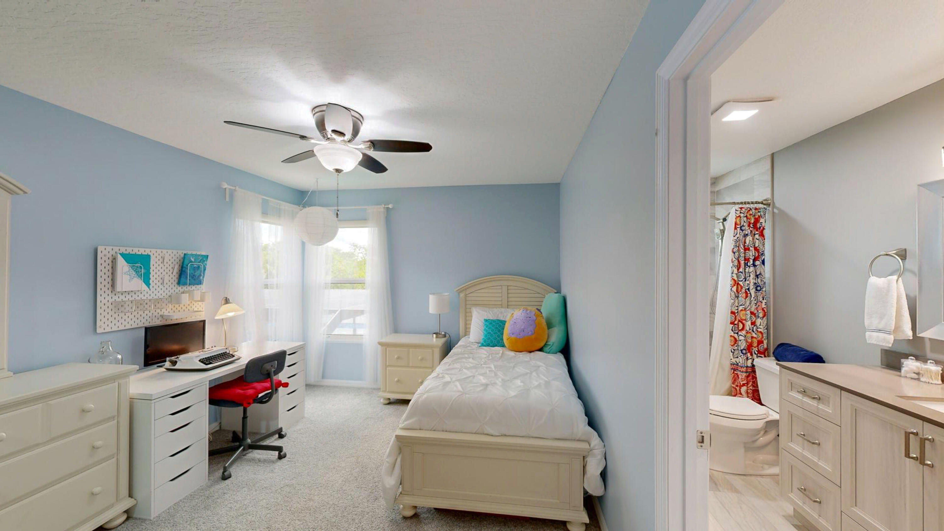 4490 Canard Road Melbourne, FL 32934 - Photo 40 of 52 a living room with furniture and a chandelier