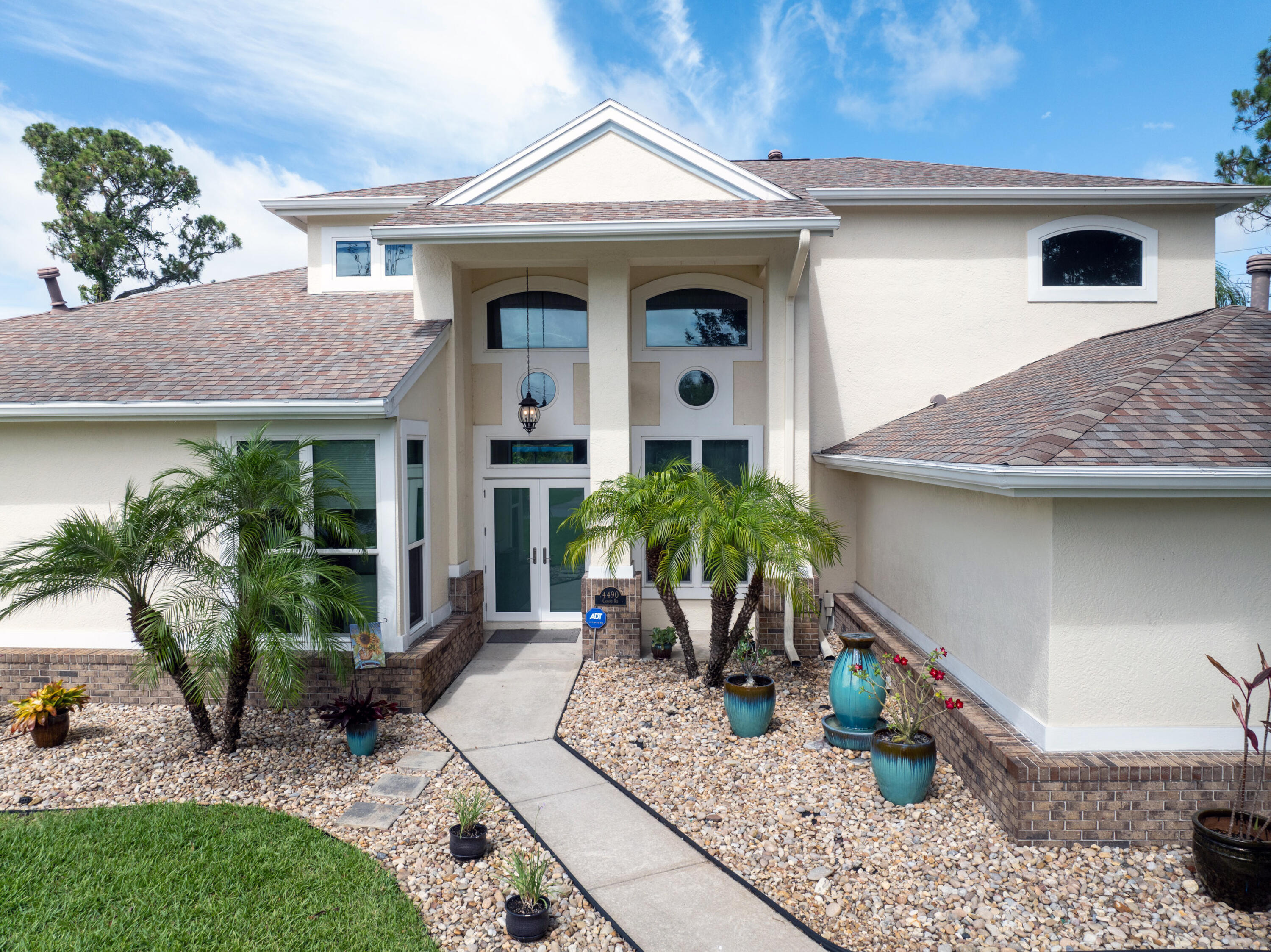 4490 Canard Road Melbourne, FL 32934 - Photo 47 of 52 a front view of a house with porch