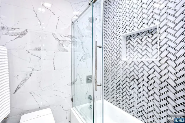 a bathroom with a shower curtain