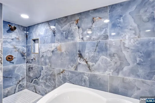 a bathroom with a bathtub