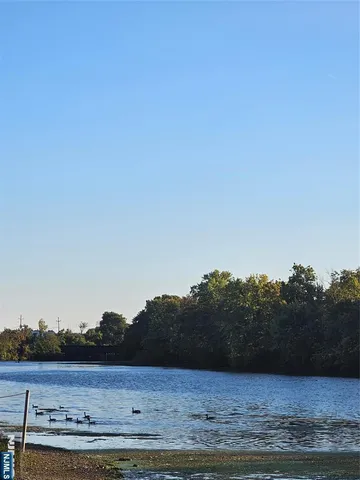 a view of a lake and mountain in the back