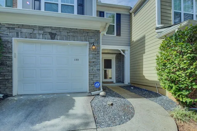 a view of entrance gate of the house