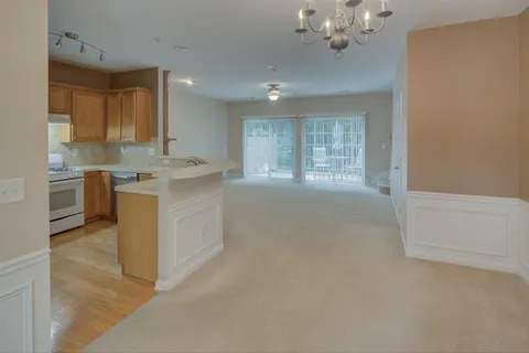 a view of a kitchen with a sink cabinets and window