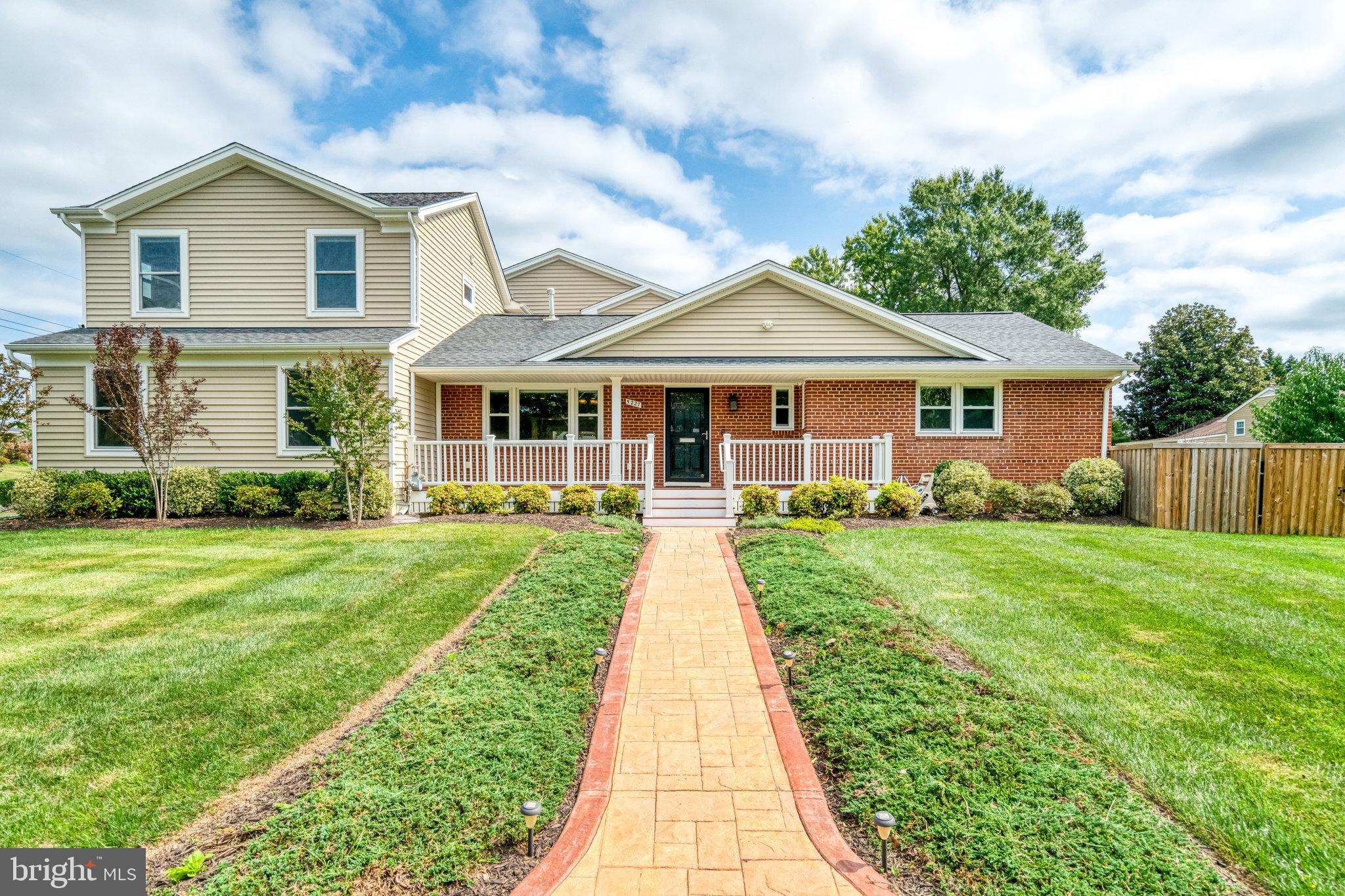 5227 Cather Road Springfield, VA 22151 - Photo 1 of 72 a view of a house with a big yard plants and large trees