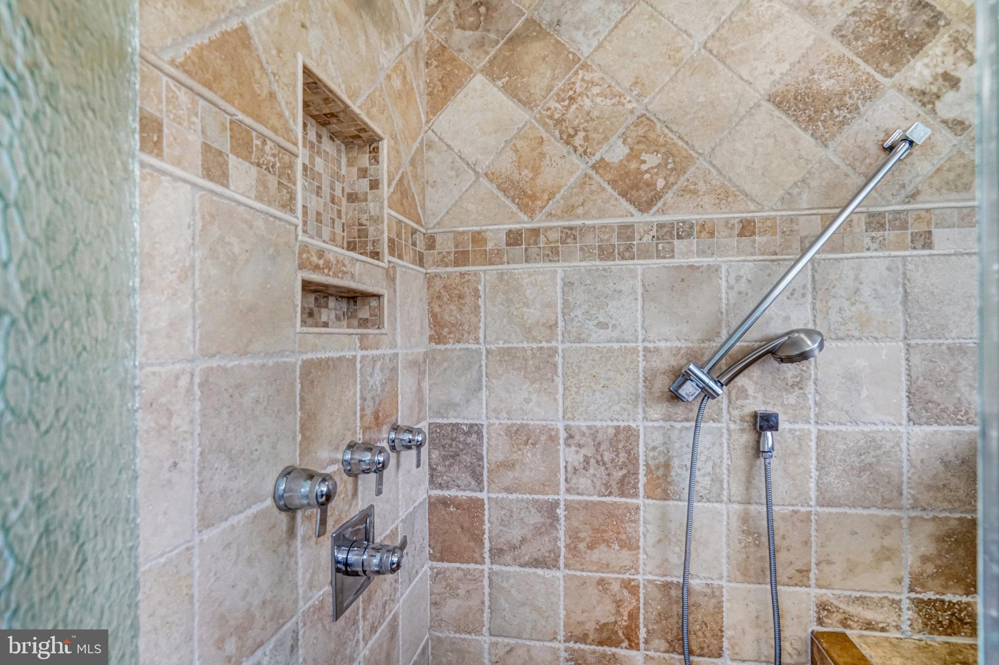 5227 Cather Road Springfield, VA 22151 - Photo 47 of 72 a bathroom with a shower