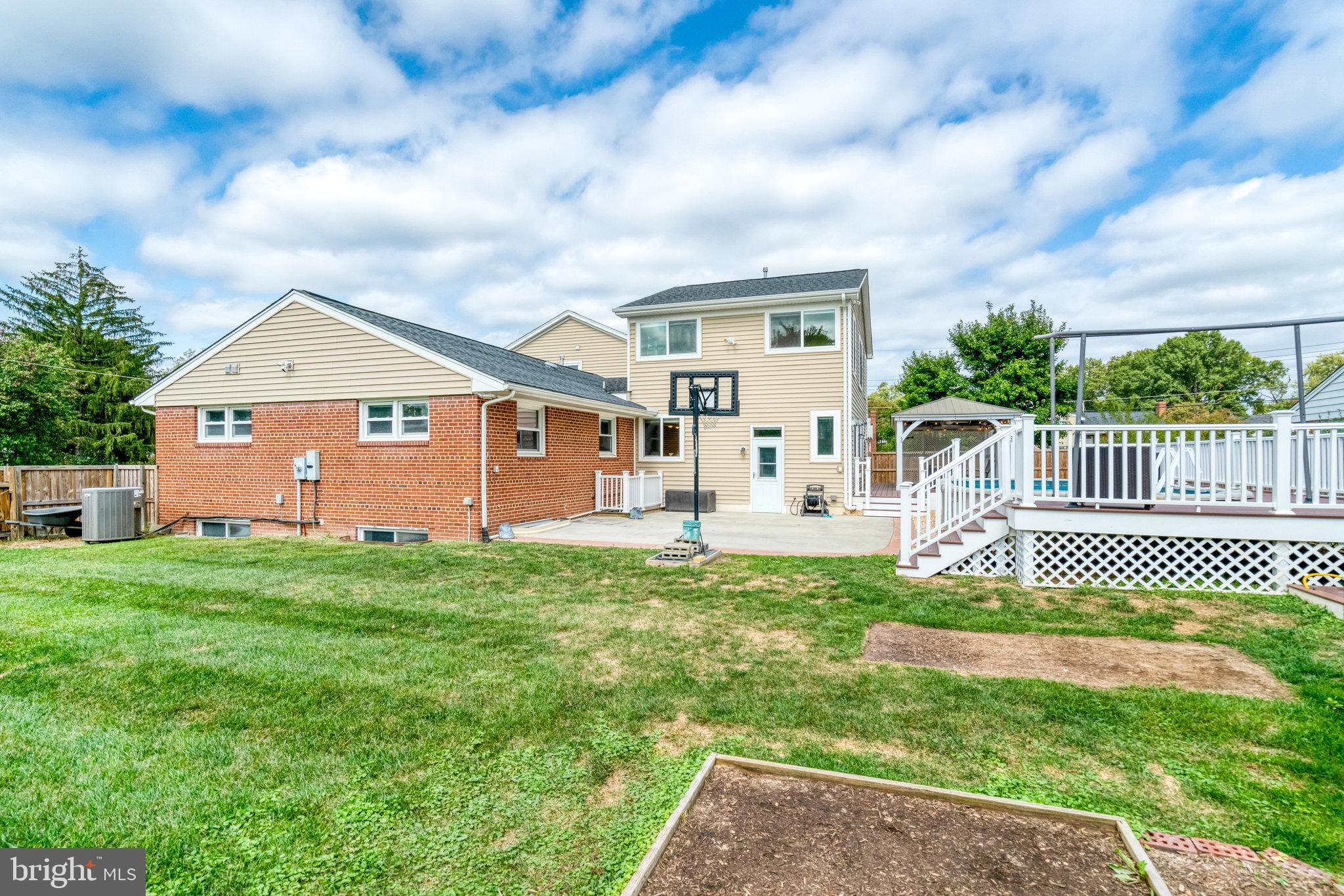5227 Cather Road Springfield, VA 22151 - Photo 63 of 72 a front view of a house with garden