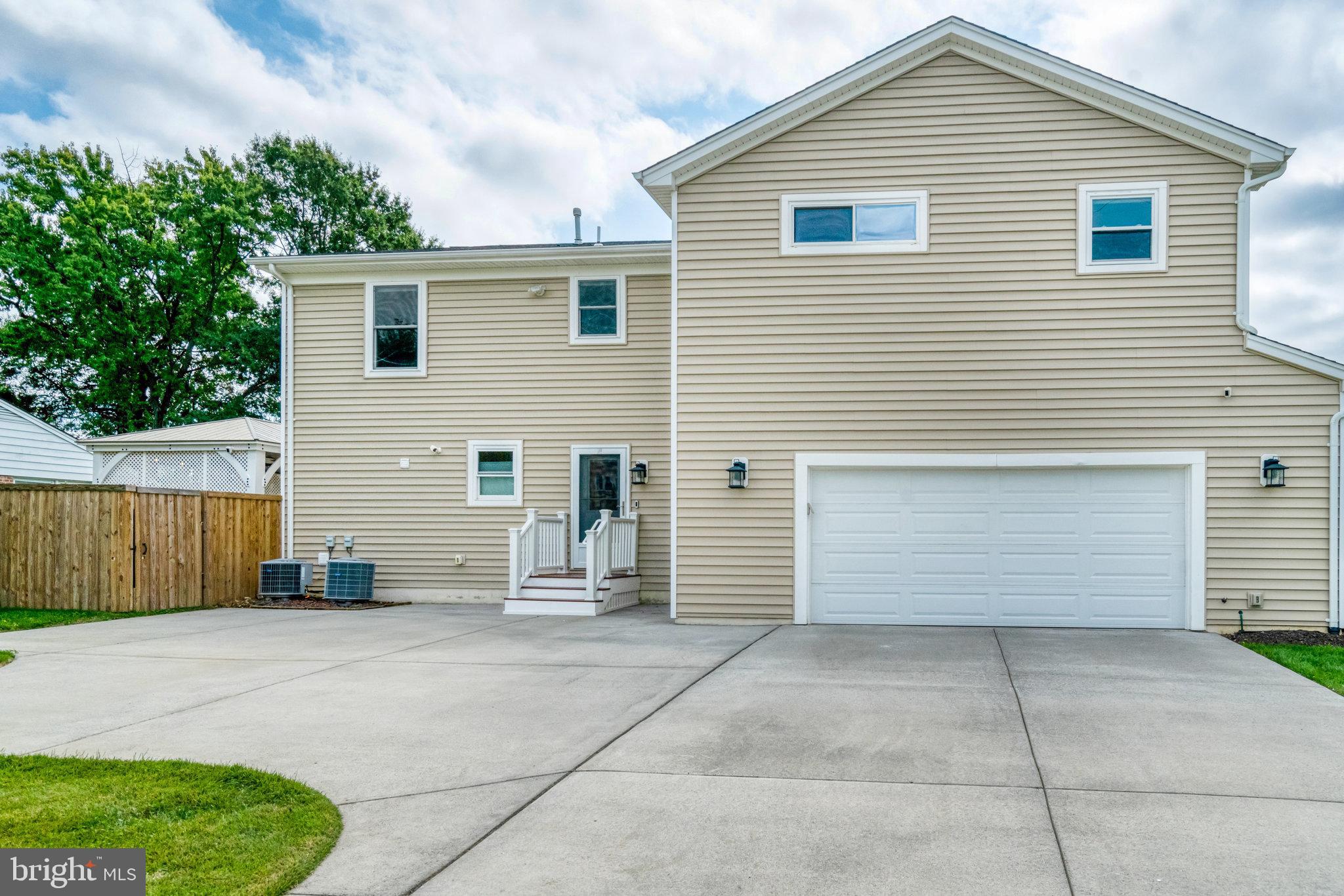 5227 Cather Road Springfield, VA 22151 - Photo 66 of 72 a view of a house with a parking area