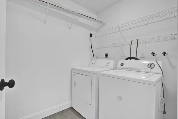 a utility room with dryer and washer