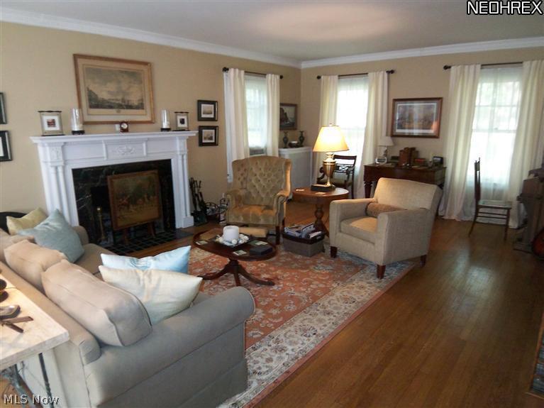 2746 Derbyshire Road Cleveland Heights, OH 44106 - Photo 4 of 24 LIVING ROOM FEATURES WOODBURNING FIREPLACE