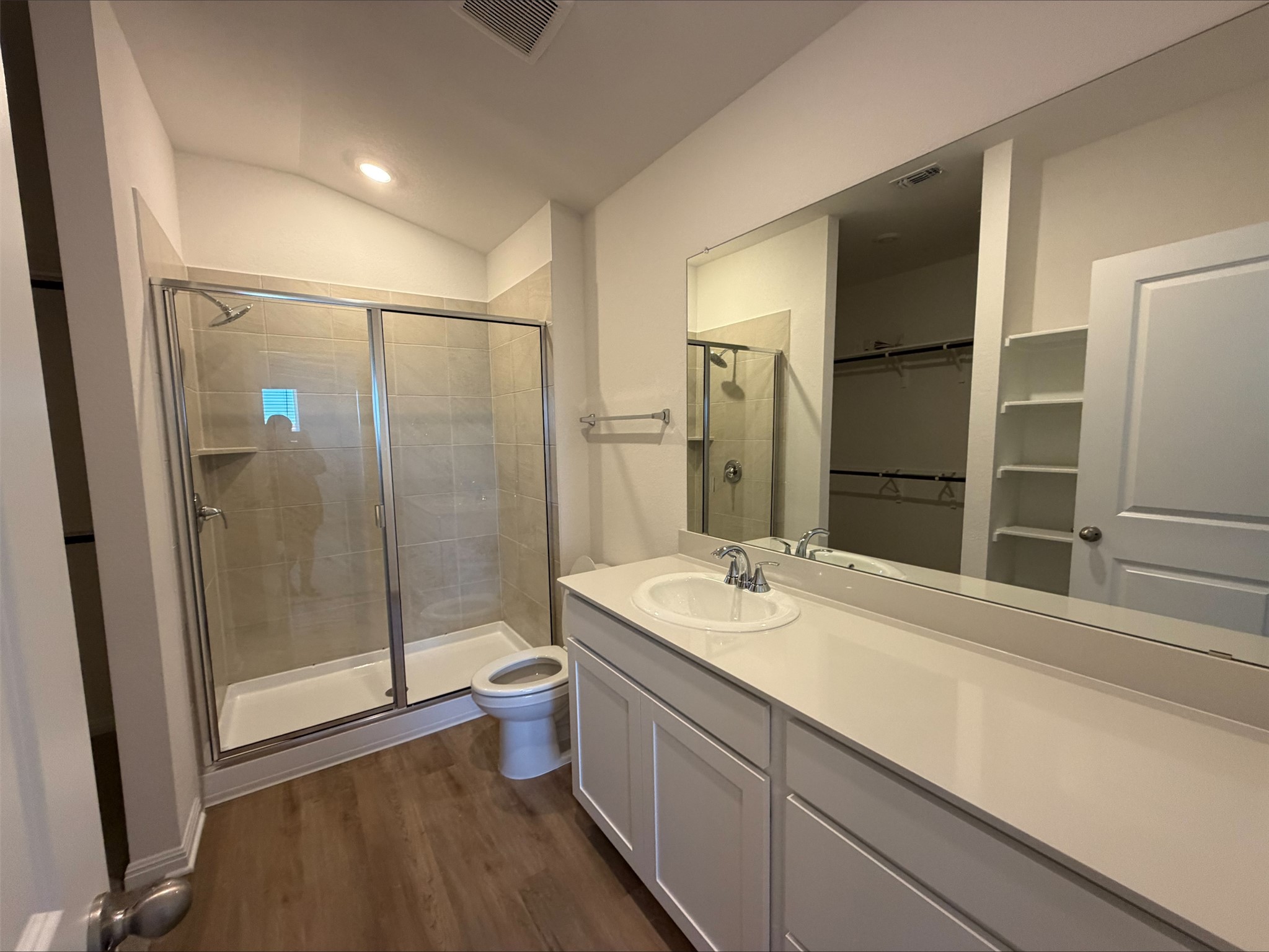 109 Honey Bee Road Jarrell, TX 76537 - Photo 6 of 10 a bathroom with a sink and a mirror