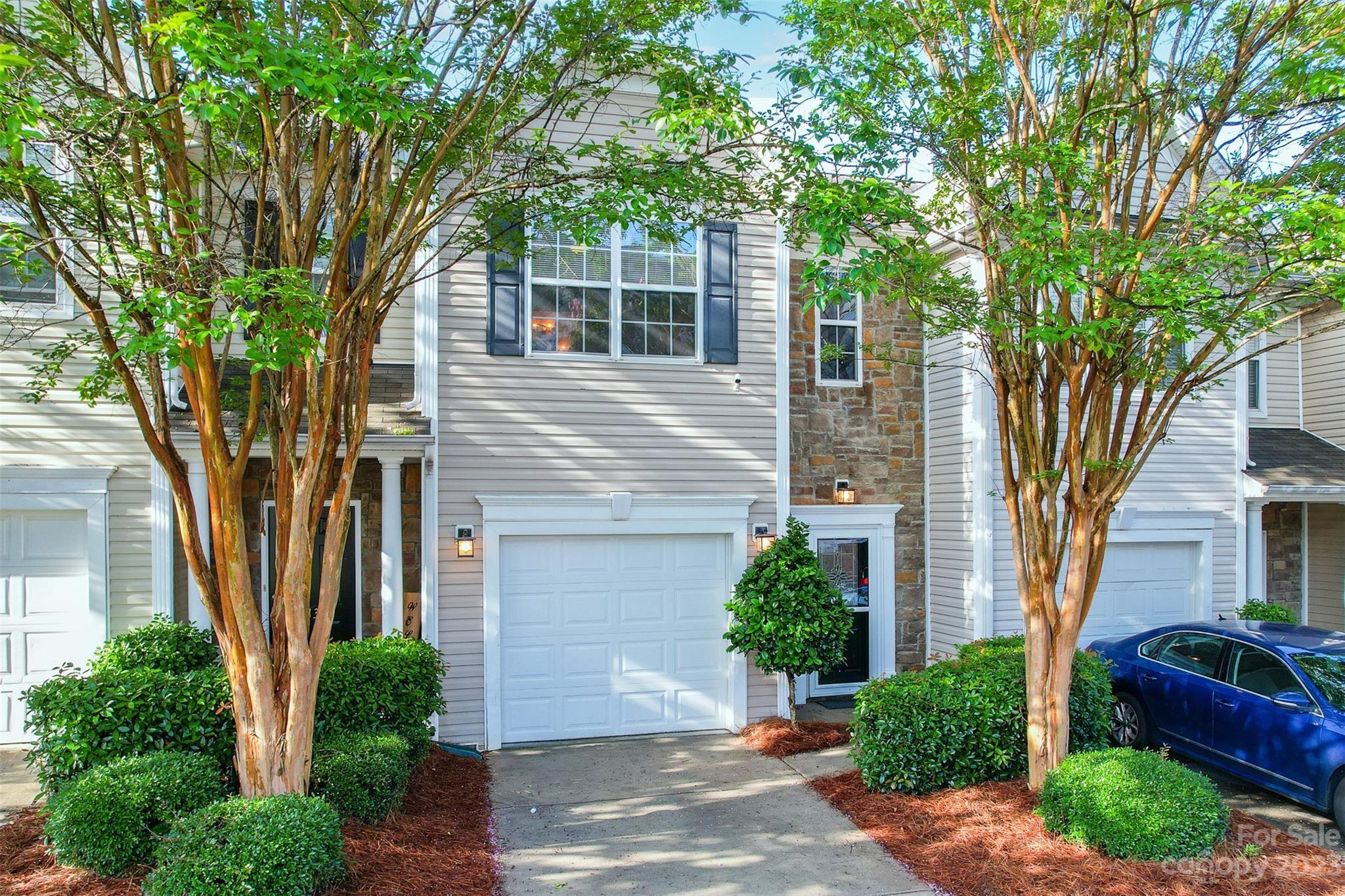 2135 Midnight Blue Lane Fort Mill, SC 29708 - Photo 3 of 22 a front view of a house with garden
