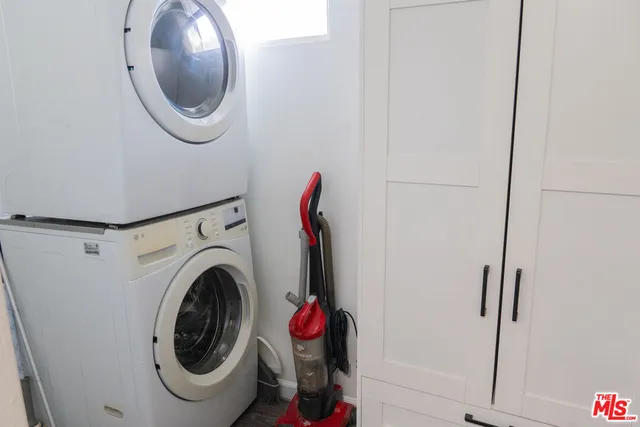 a bathroom with a sink and a window