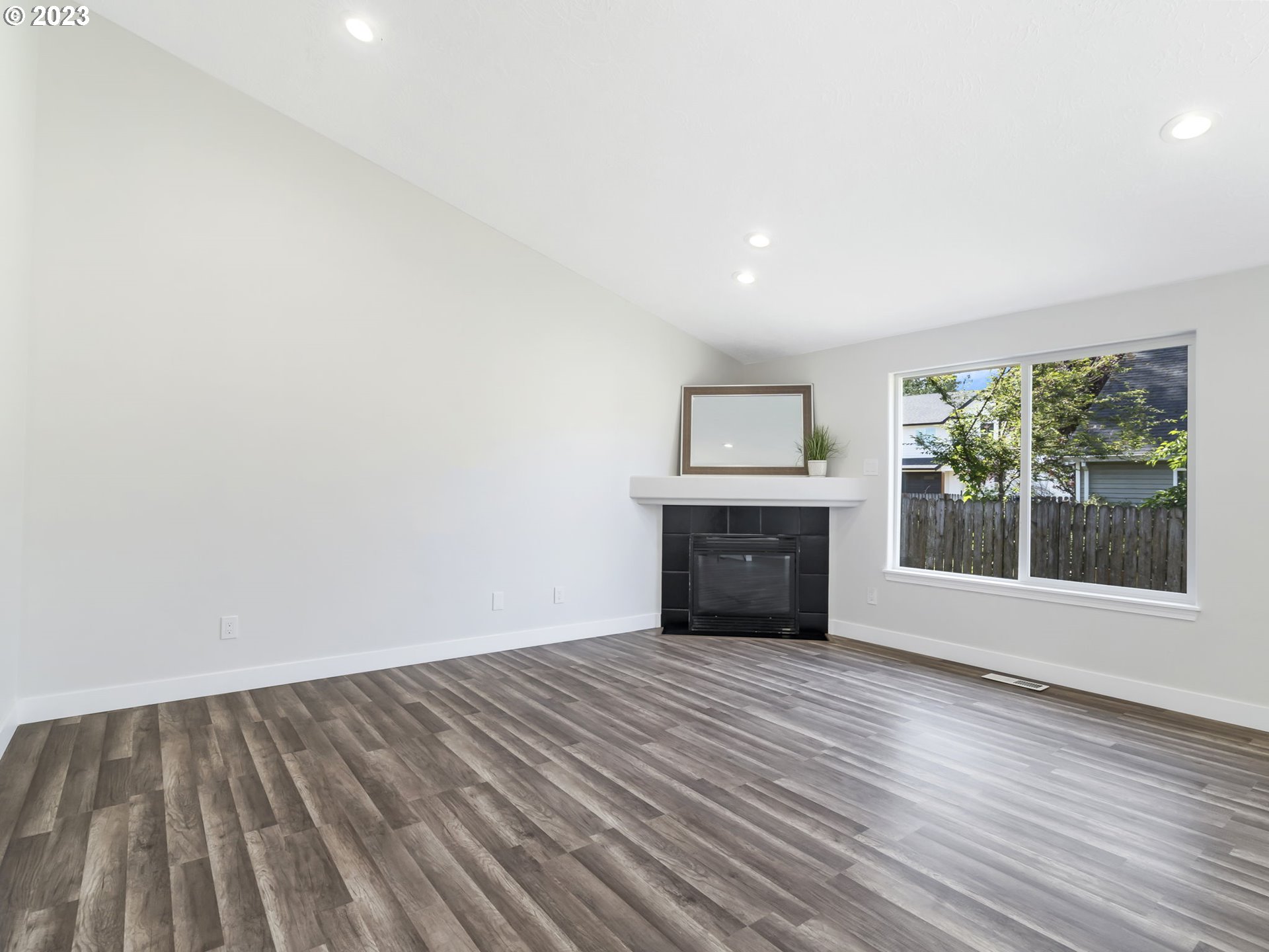 15268 Penny Avenue Sandy, OR 97055 - Photo 14 of 35 wooden floor in an empty room with a window