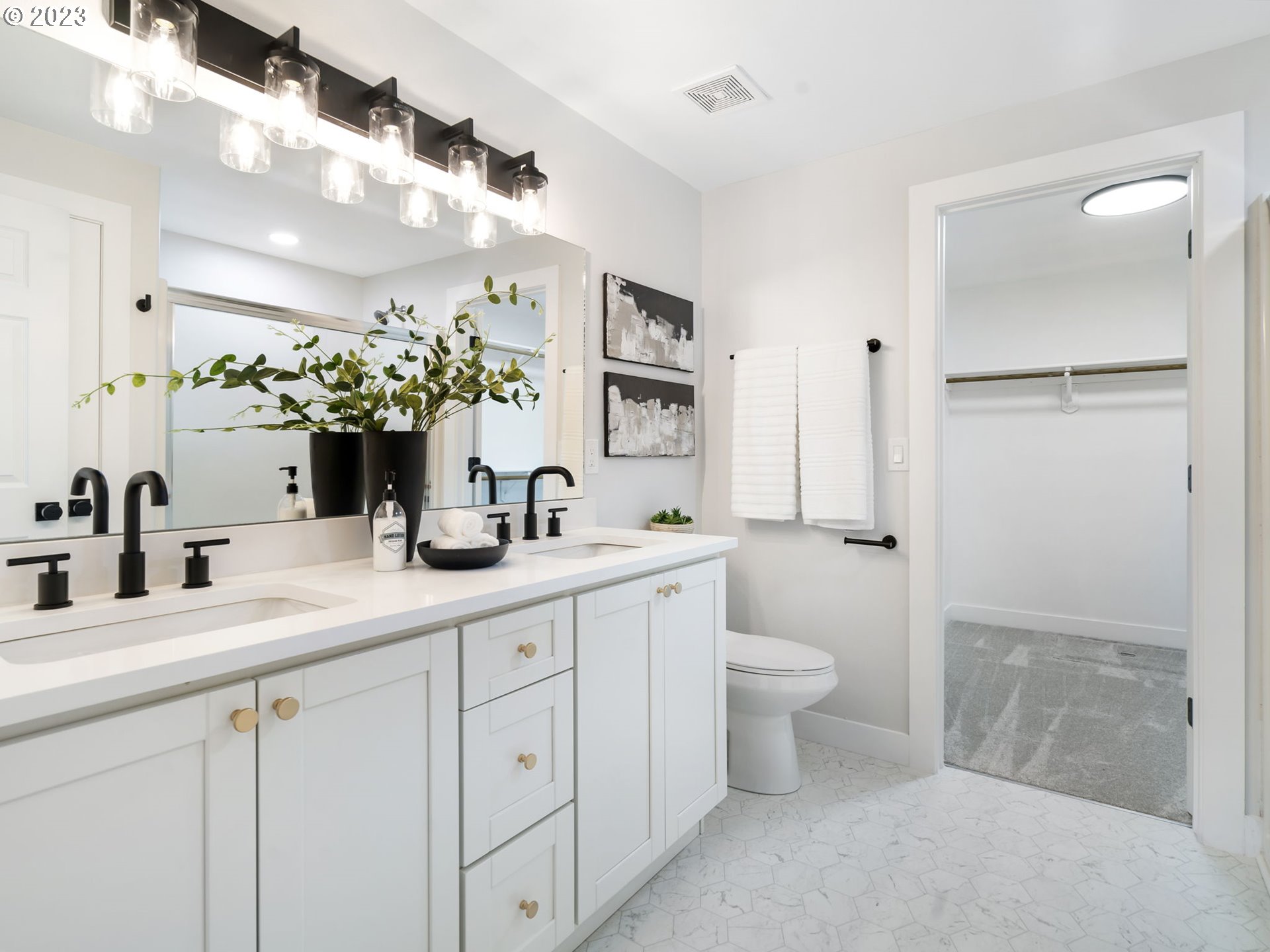 15268 Penny Avenue Sandy, OR 97055 - Photo 21 of 35 a bathroom with a double vanity sink toilet and shower